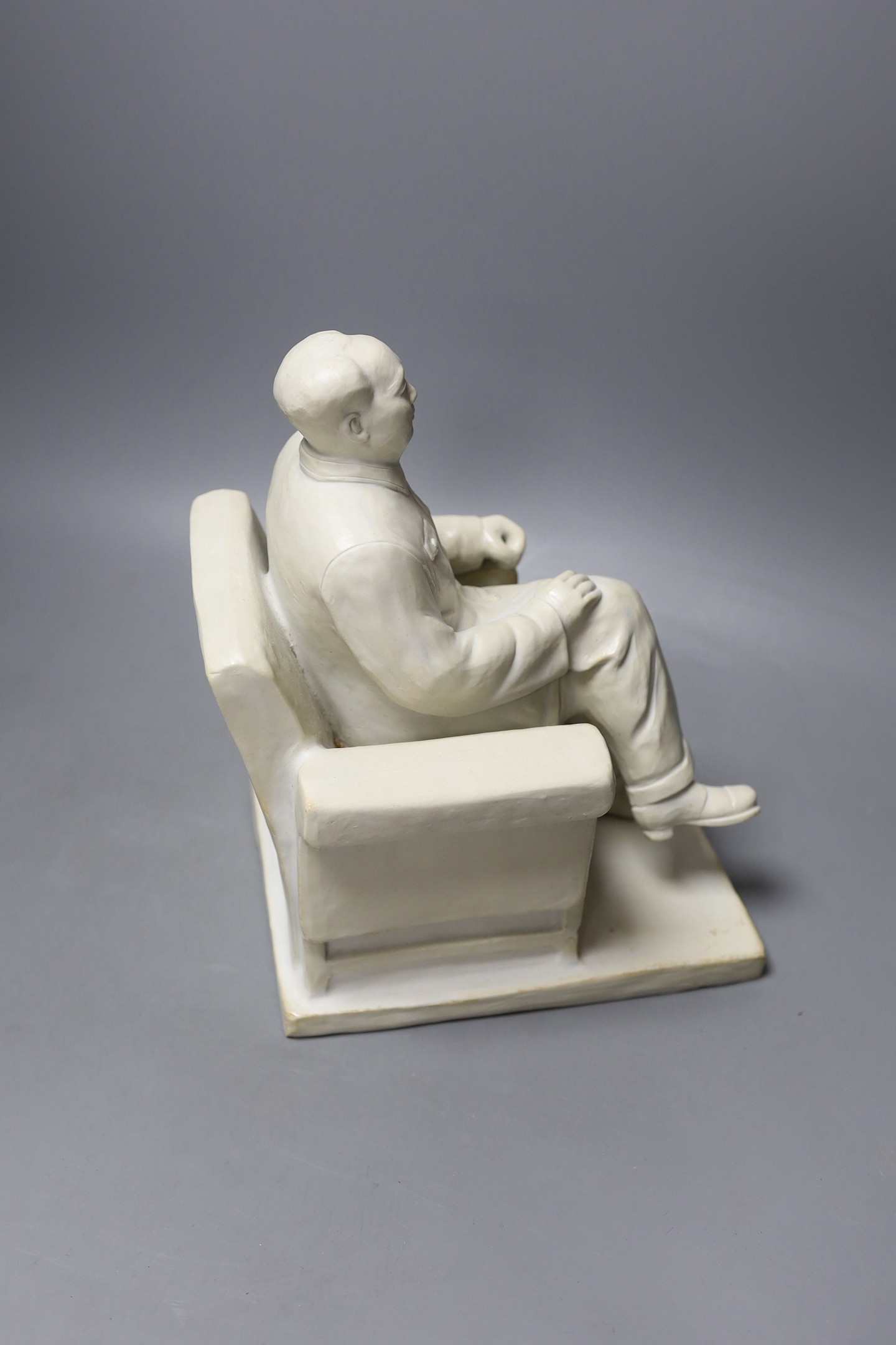 A Chinese biscuit porcelain figure of Chairman Mao, 26cm